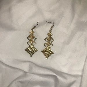 Dangling gold earrings
